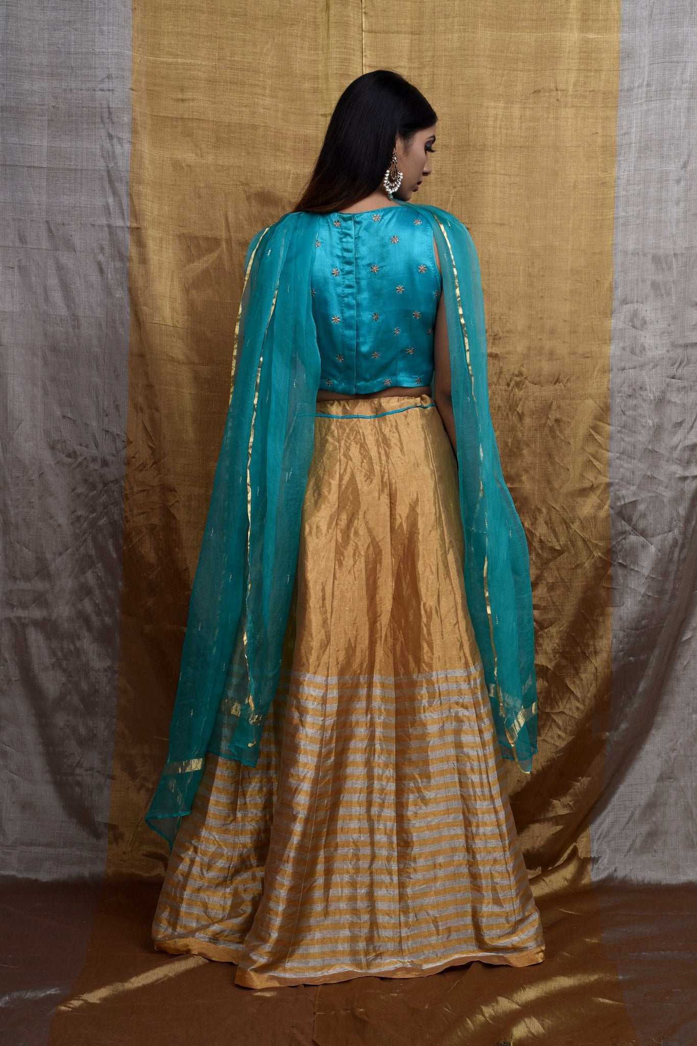 Charisma Gold & Turqoise Lehenga Set